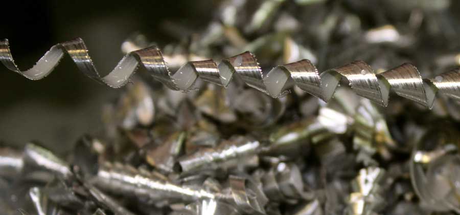 Close ups of curls of metal from drilling 