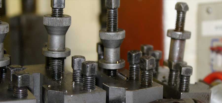 Close up of some bolts of a CNC Milling machine